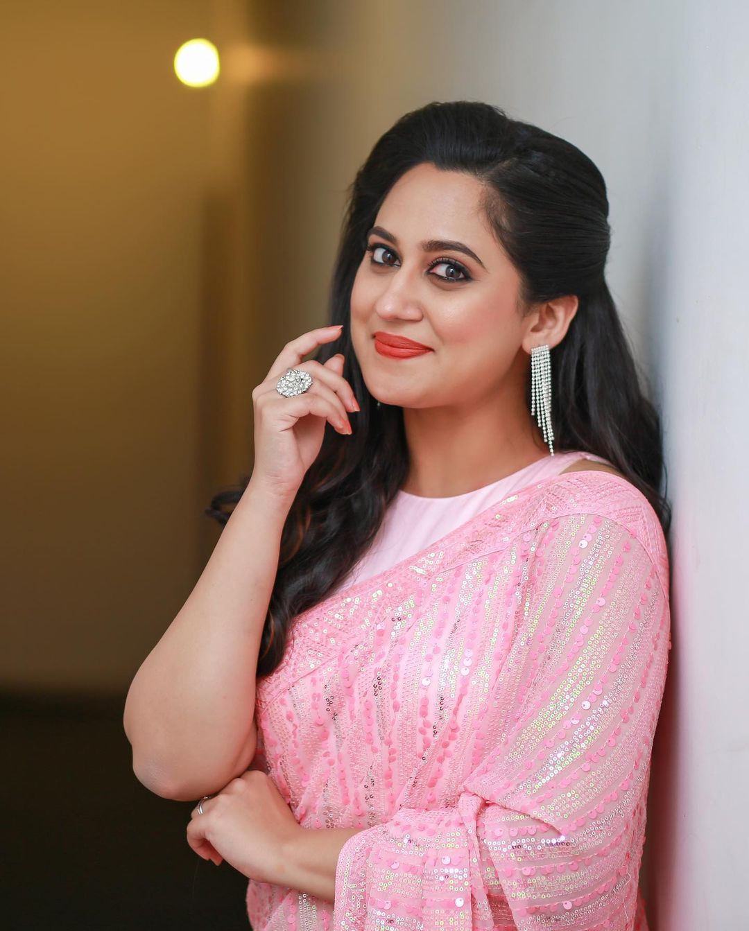 malayalam actress miya george stills in sleeveless pink saree